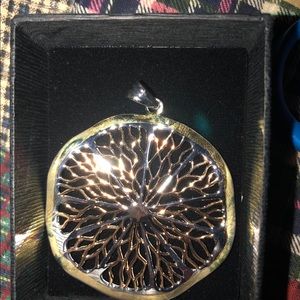 Gold and silver pendant